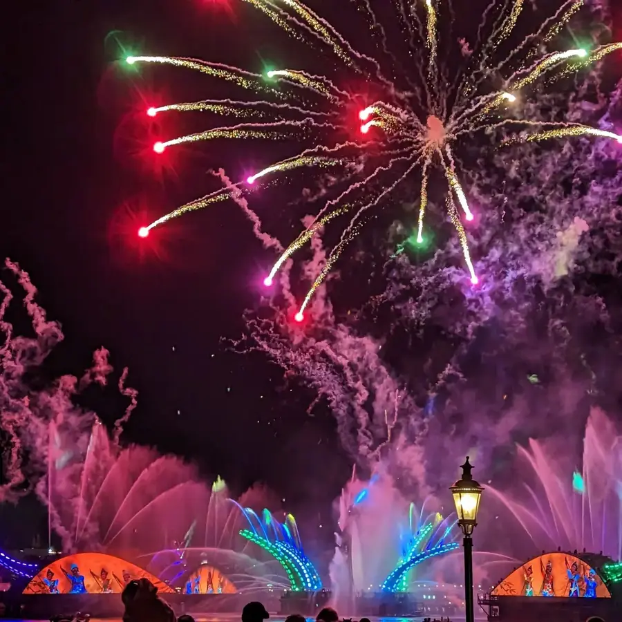 Colorful fireworks over EPCOT's fountain show