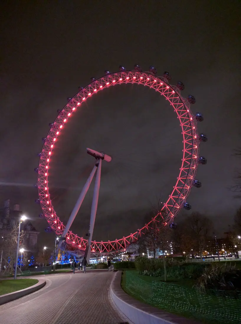 The London Eye lit at night, England
