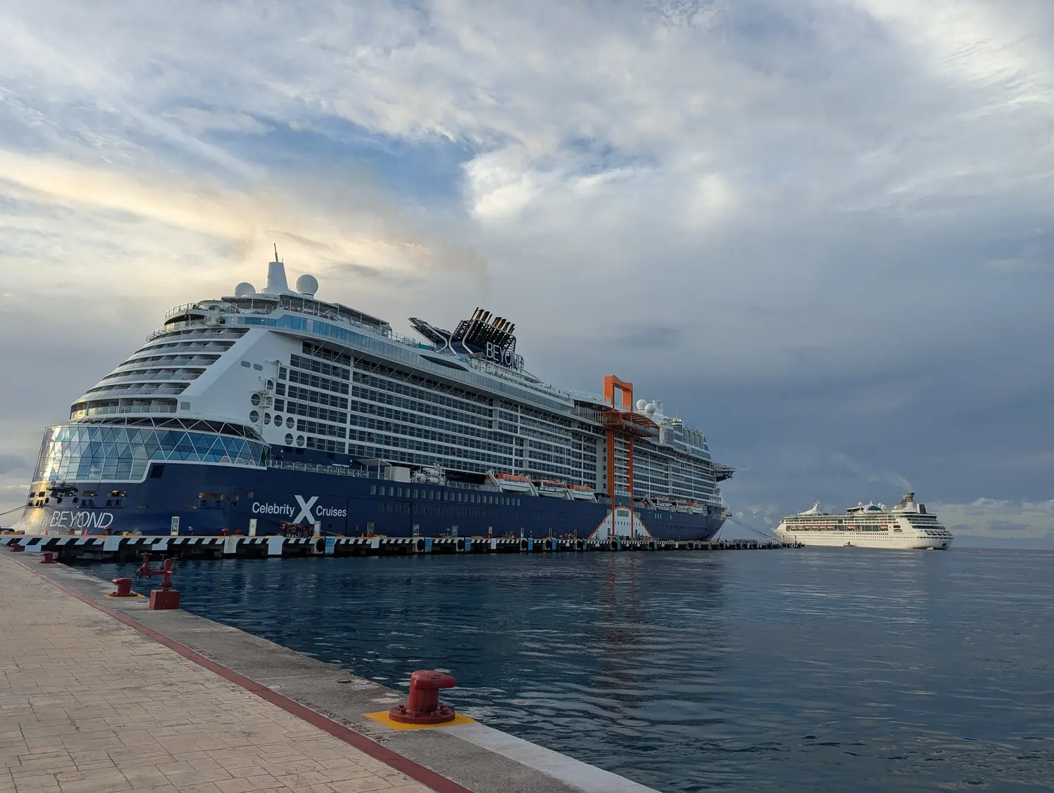 Harbor full of yachts and ships along a Mediterranean waterfront